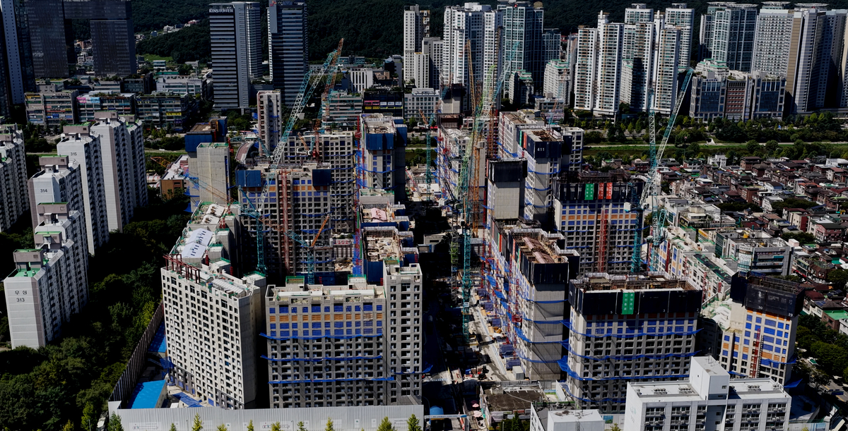 Remodeled apartment interior showing expanded layout and parking improvements