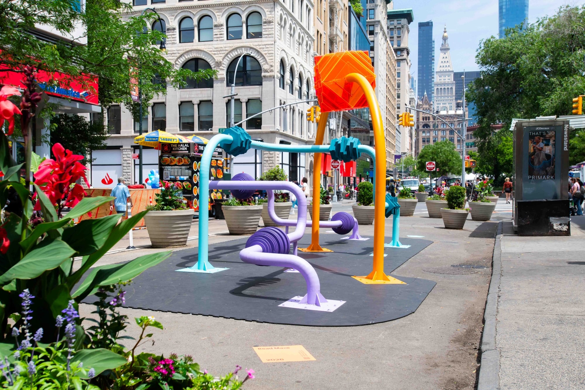 Interactive bead maze sculpture installed at Union Square, allowing passersby to engage with the artwork directly