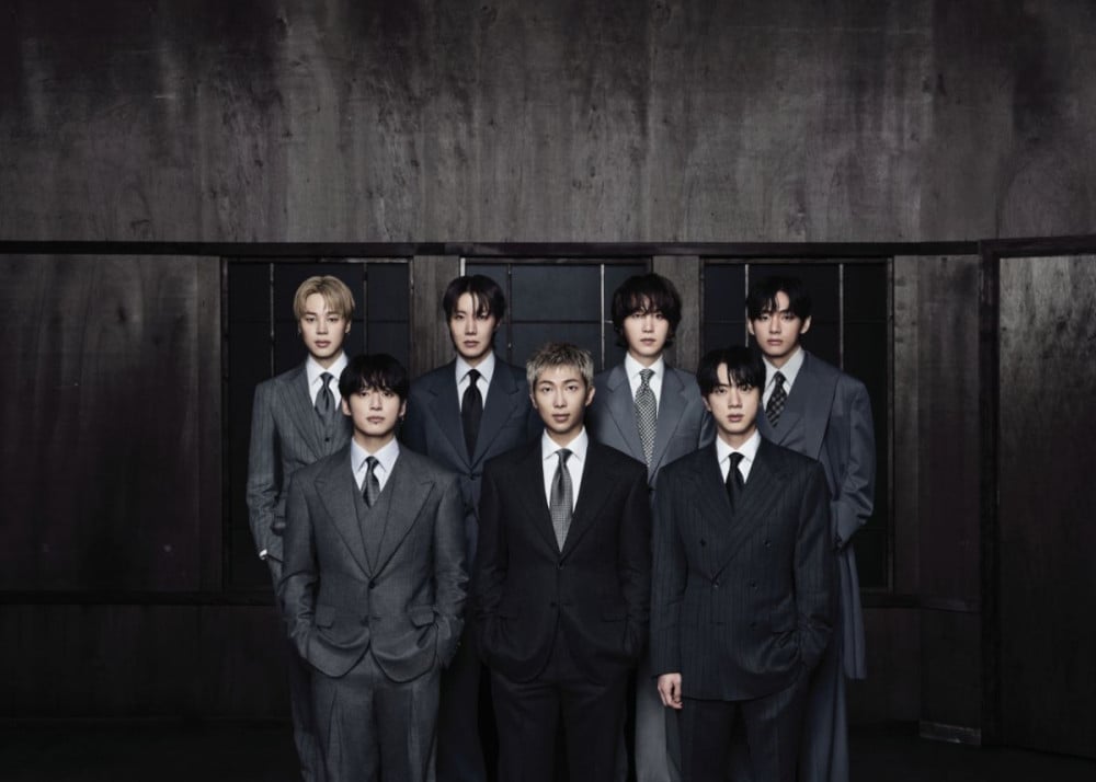 BTS group photo celebrating their Spotify milestone