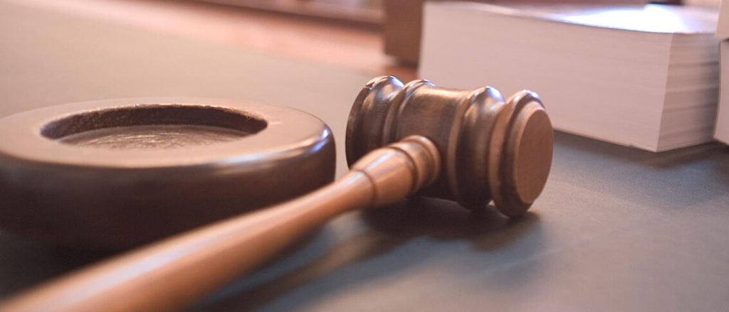 Courtroom gavel symbolizing legal sanctions for AI errors