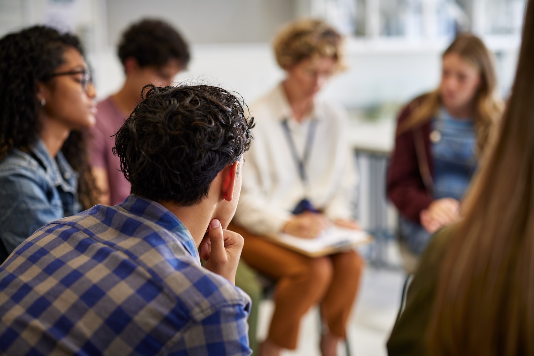 Students creating AI policy at a conference