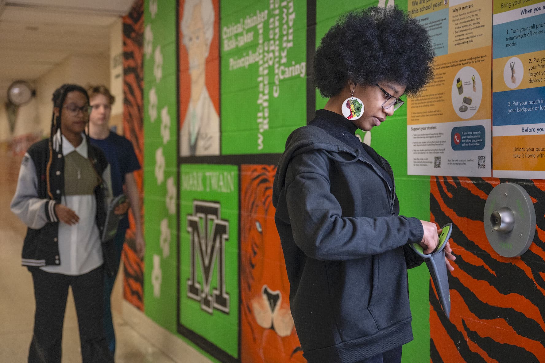 Students in a classroom setting without phones