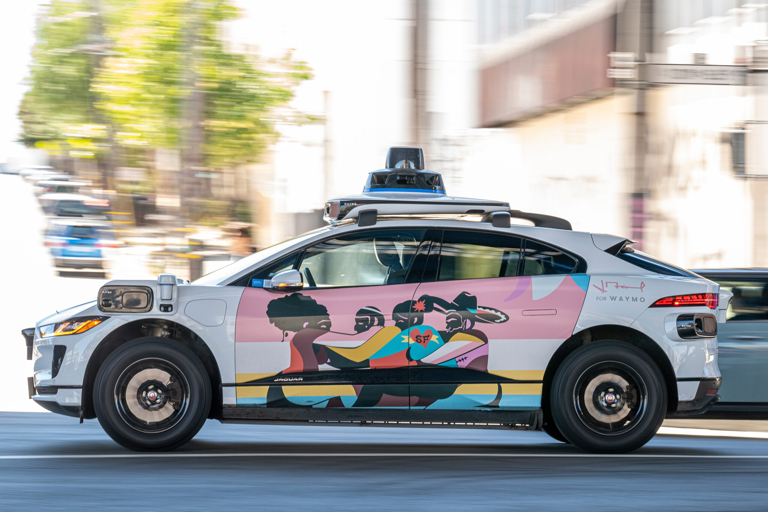 Waymo robotaxi in autonomous operation on San Francisco street