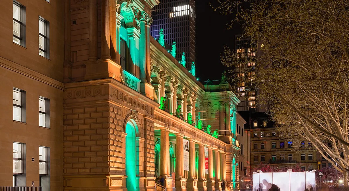 Frankfurt Stock Exchange at night with lit trading boards