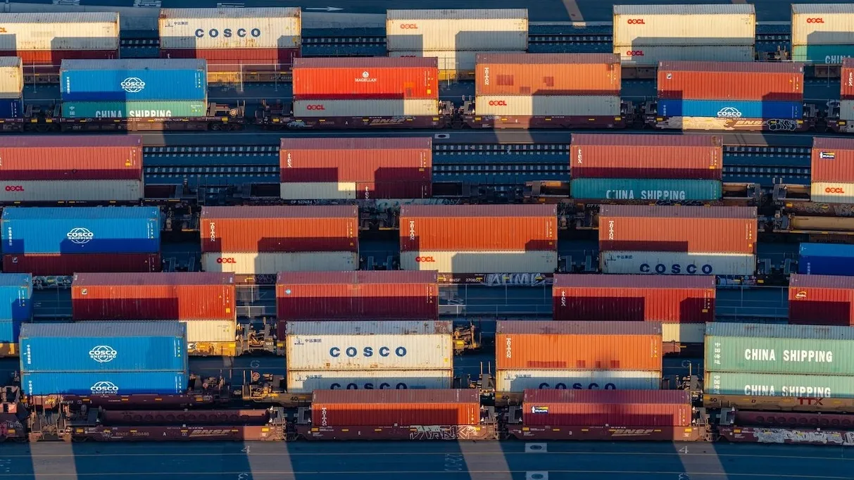 Stacked shipping containers at the Port of Long Beach awaiting transport