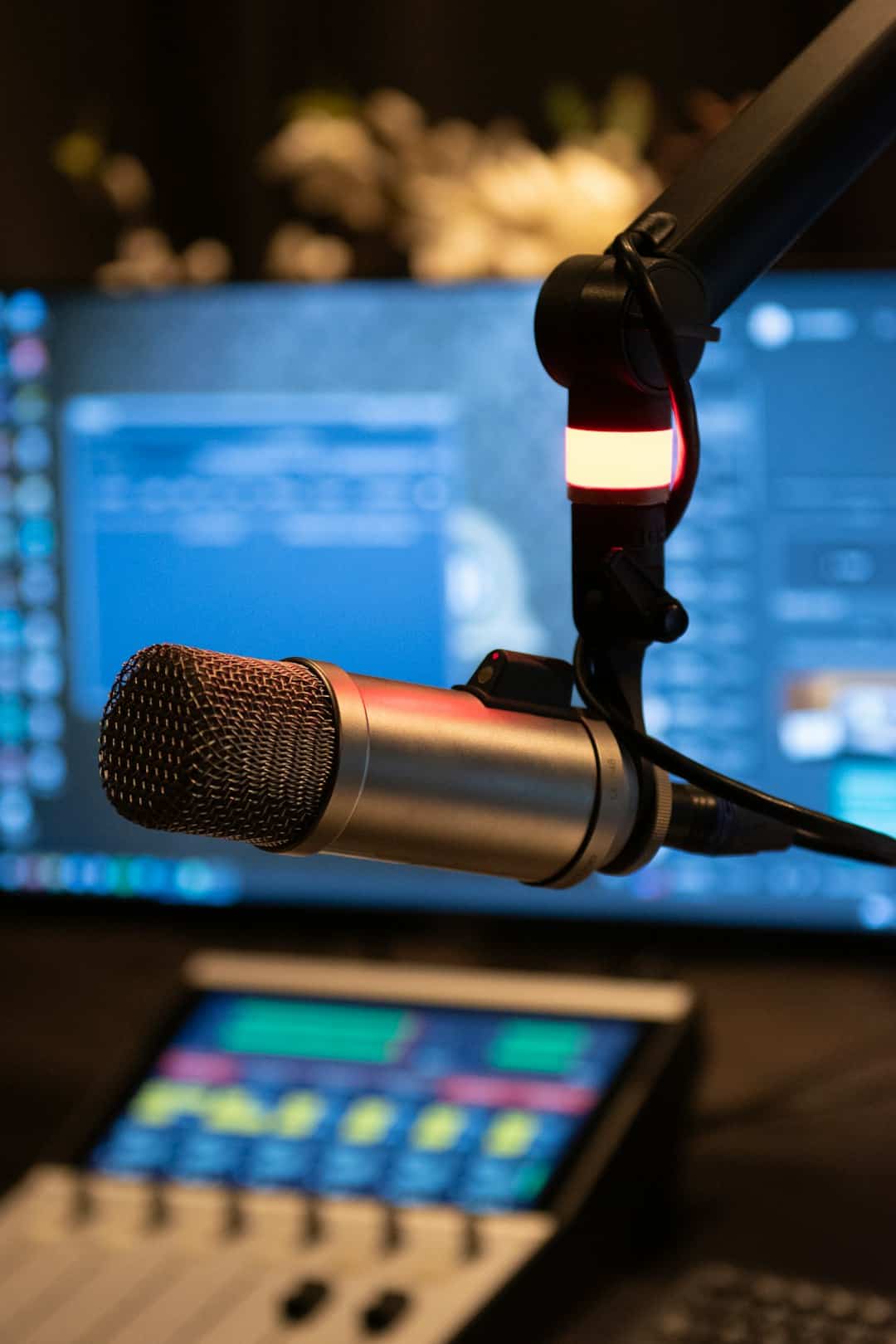 Streaming studio with microphone and laptop setup
