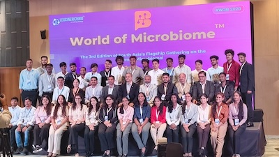 On-site photo discussing microbiome science as preventive healthcare at the World of Microbiome 2026 conference