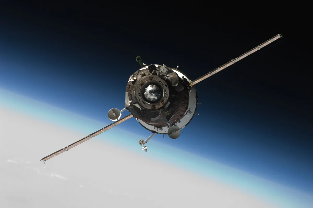 Concept art of satellite maneuvering
