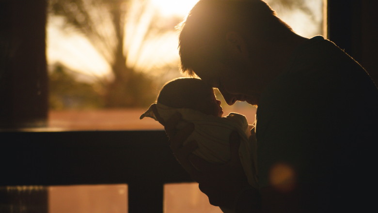 Father embracing child illustration from King's College London report