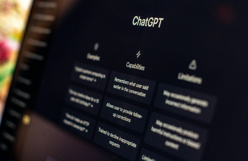 Lawyer reviewing documents with AI interface