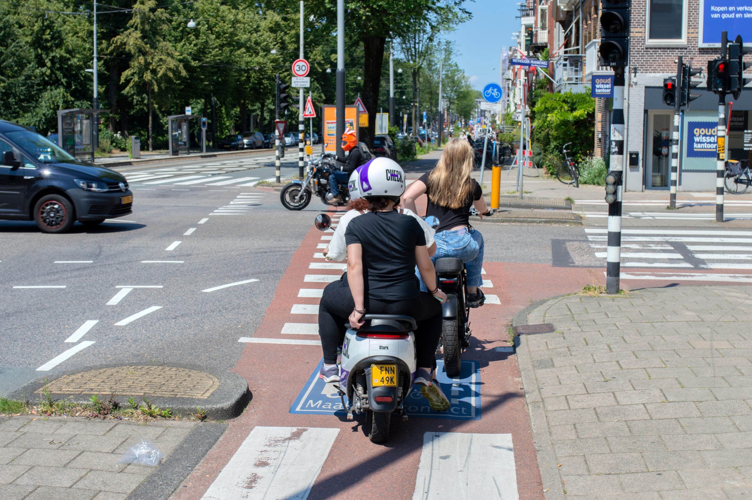 Illustration of a crowded Dutch cycle path with modern e-bikes