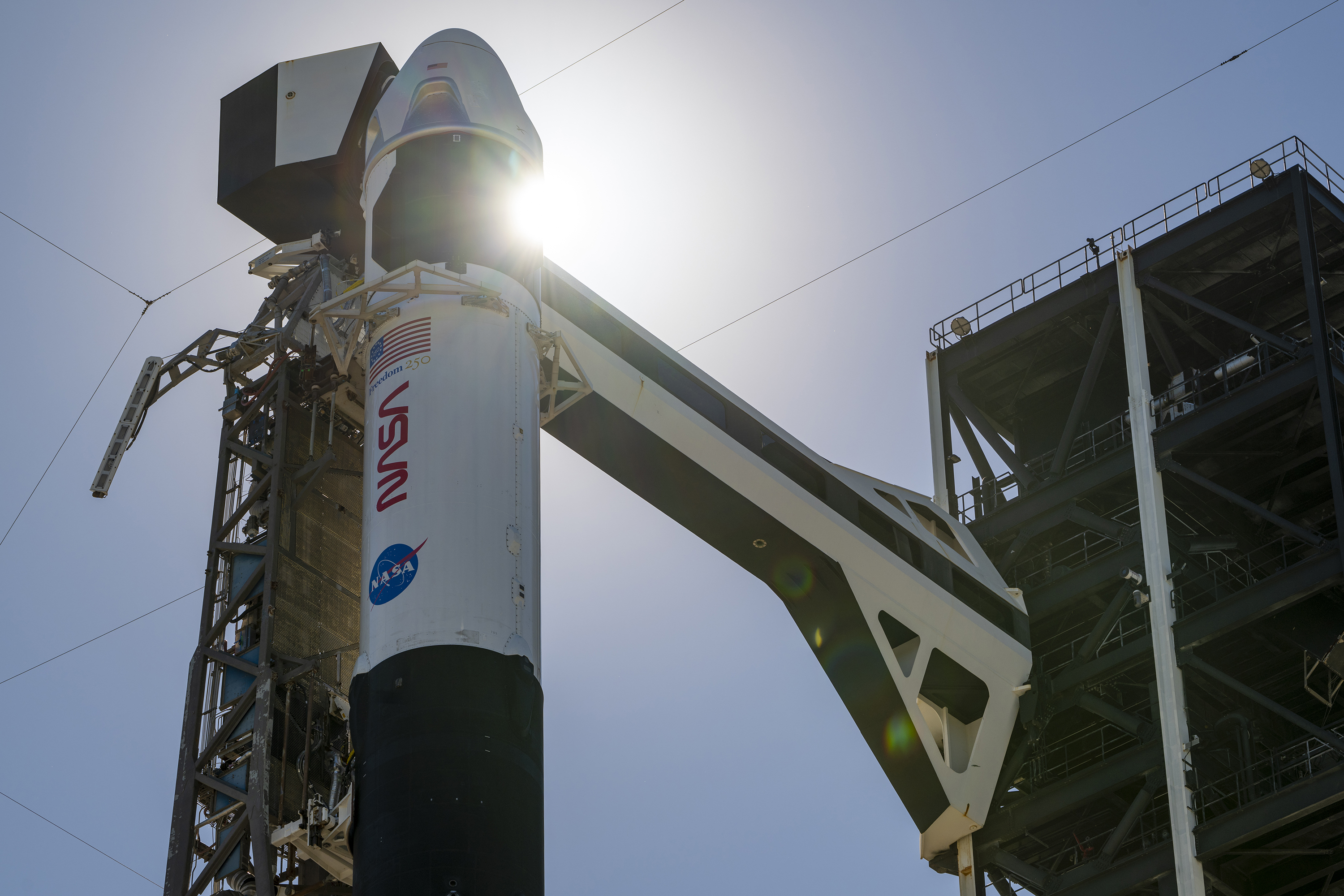 Crew-13 Falcon 9 and Dragon standing vertical on the launch pad