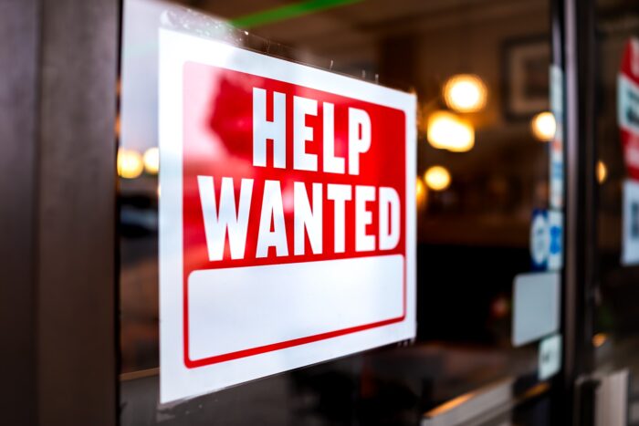 Help-wanted sign indicating demand for new journalism roles