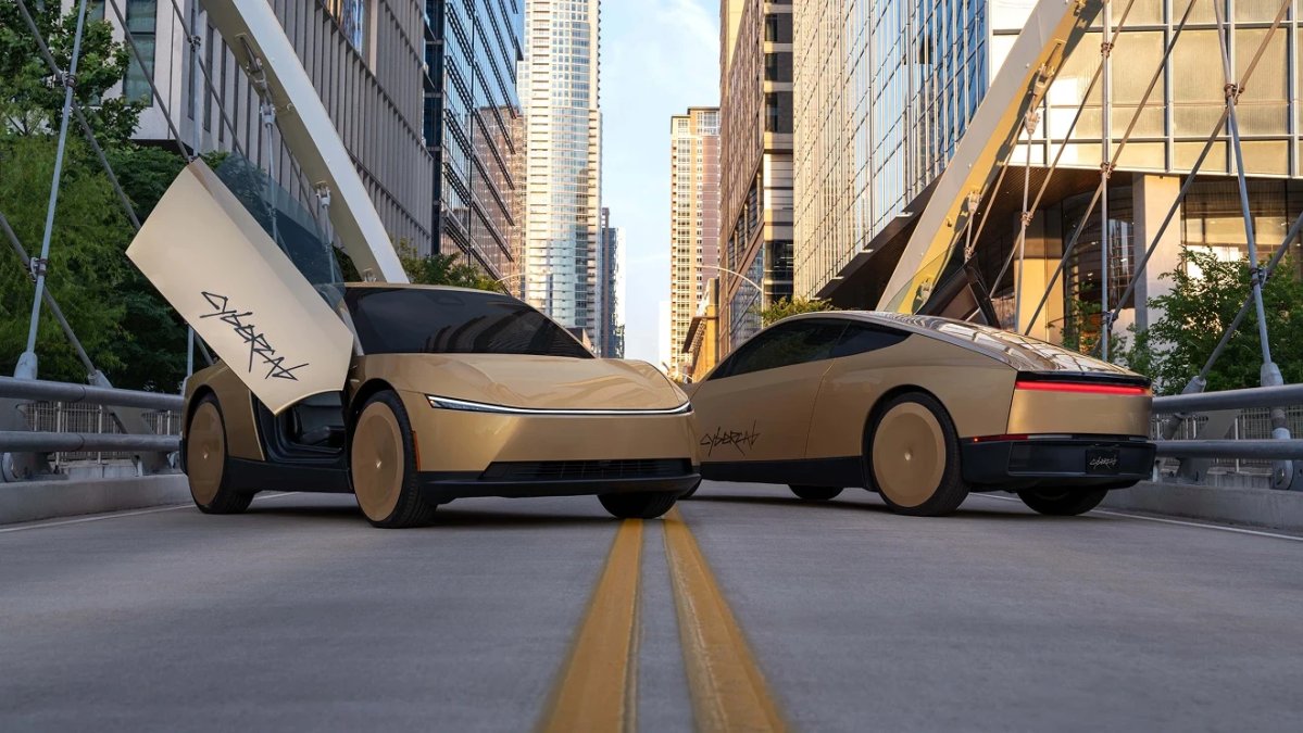 Two Cybercabs on a street