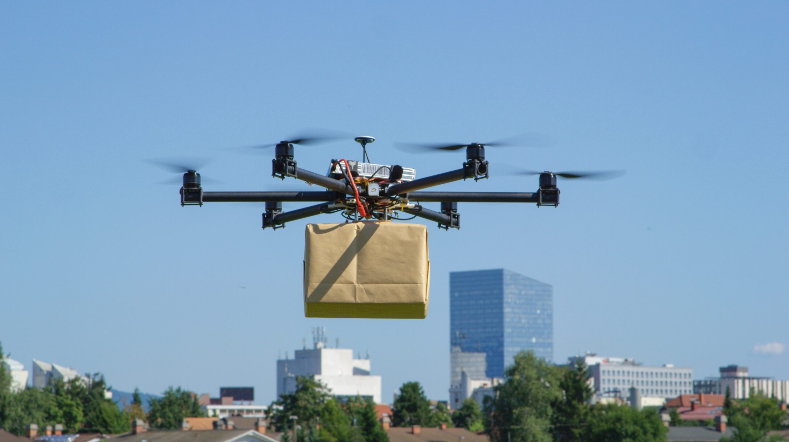Last-mile delivery drone — aerial logistics imagery