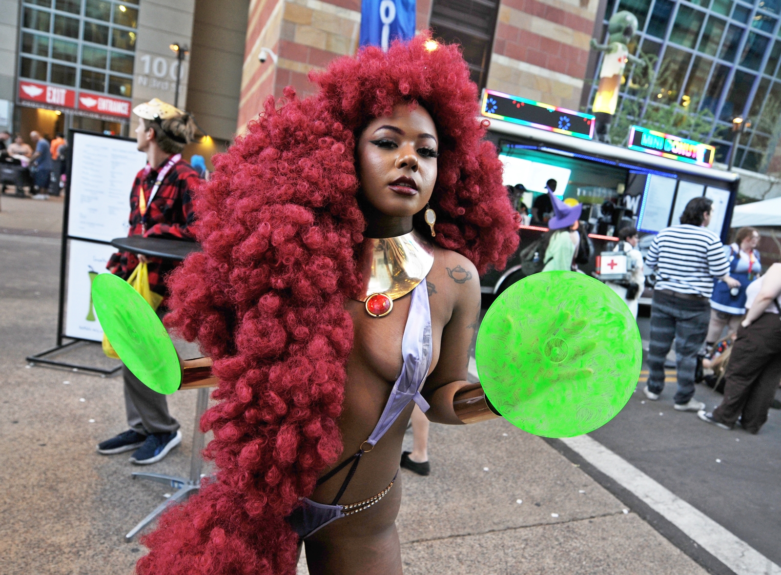 Elaborate cosplay costume inspired by Starfire character at Phoenix Fan Fusion