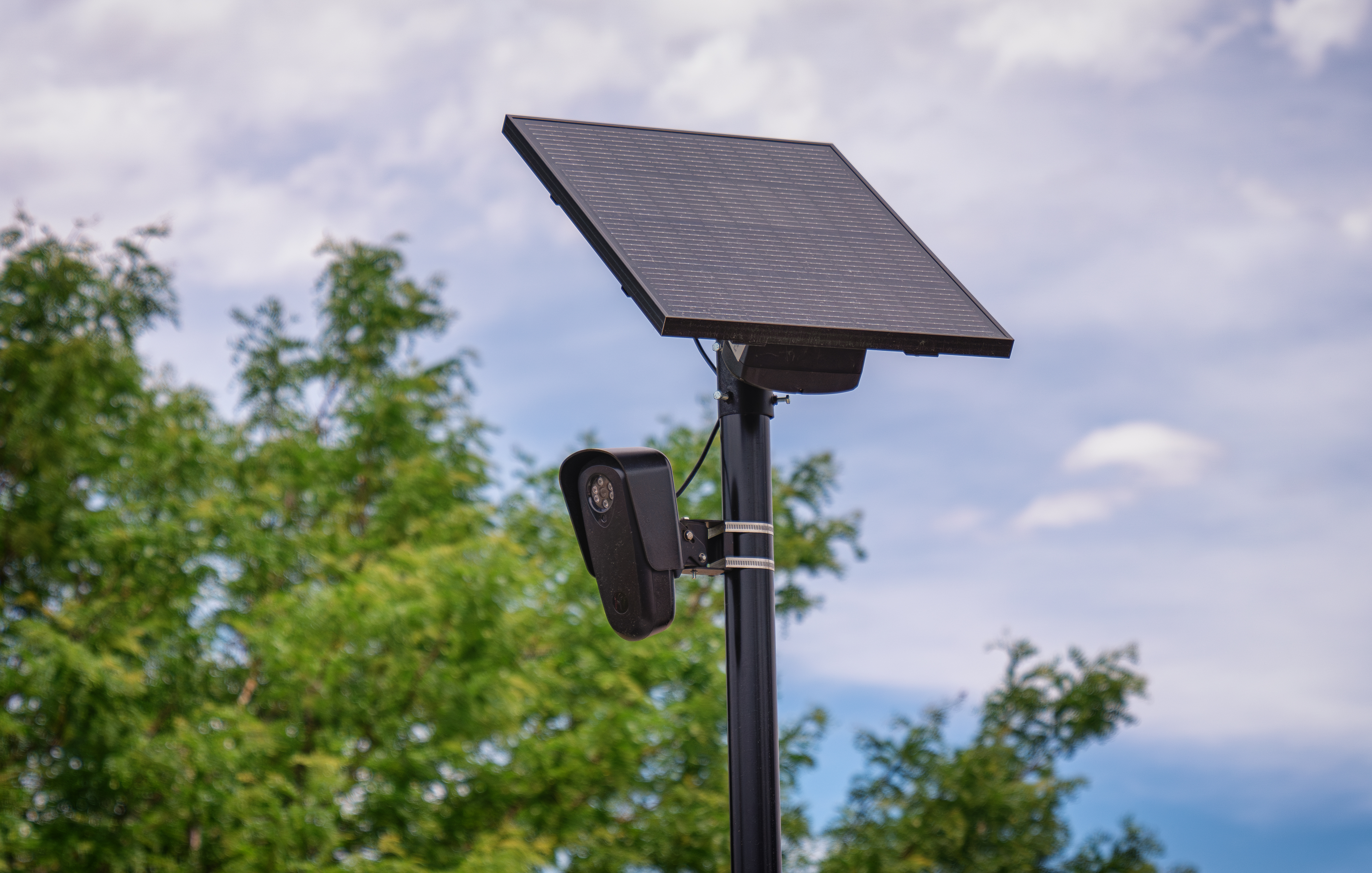 Flock Safety ALPR camera mounted on a pole in an urban setting