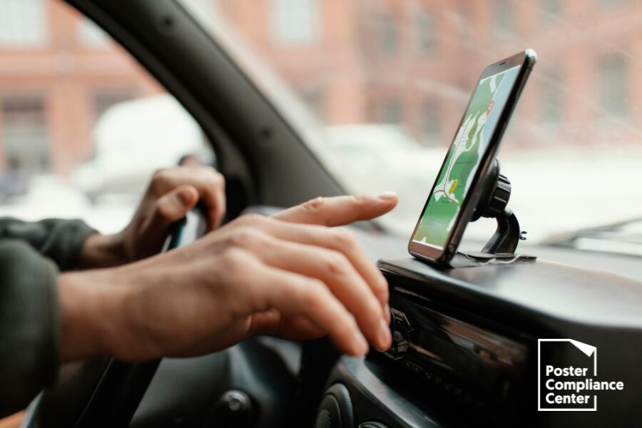A ride-share gig worker beside a vehicle illustrating app-based labor classification challenges