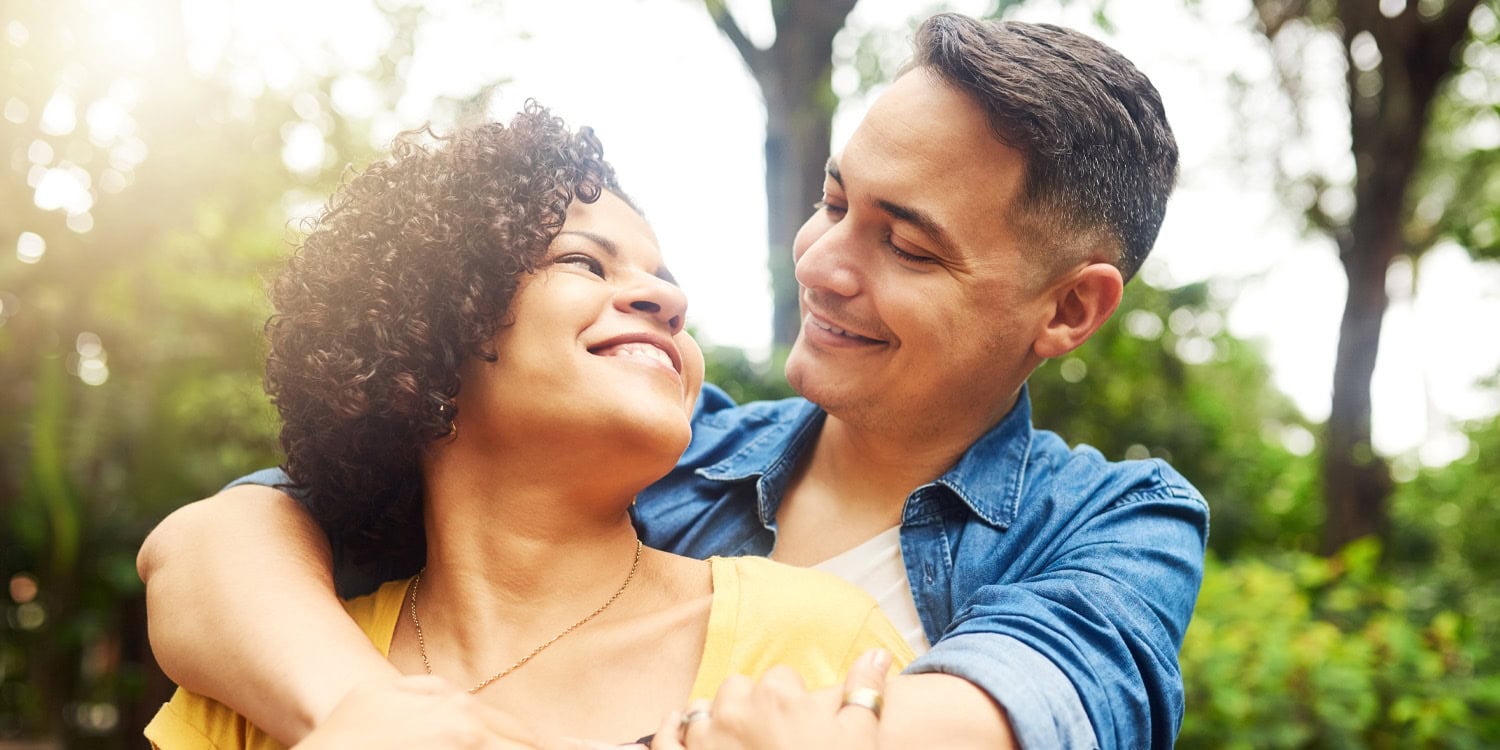 Happy couple illustrating relationship satisfaction research