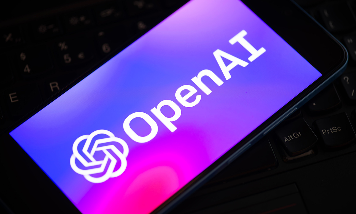 OpenAI logo displayed against a blue background, illustrating the company's massive valuation ambitions