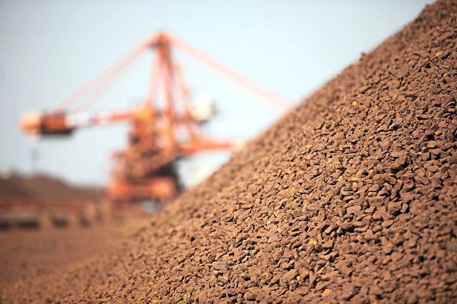 Iron ore export vessel departing Brazilian port terminal