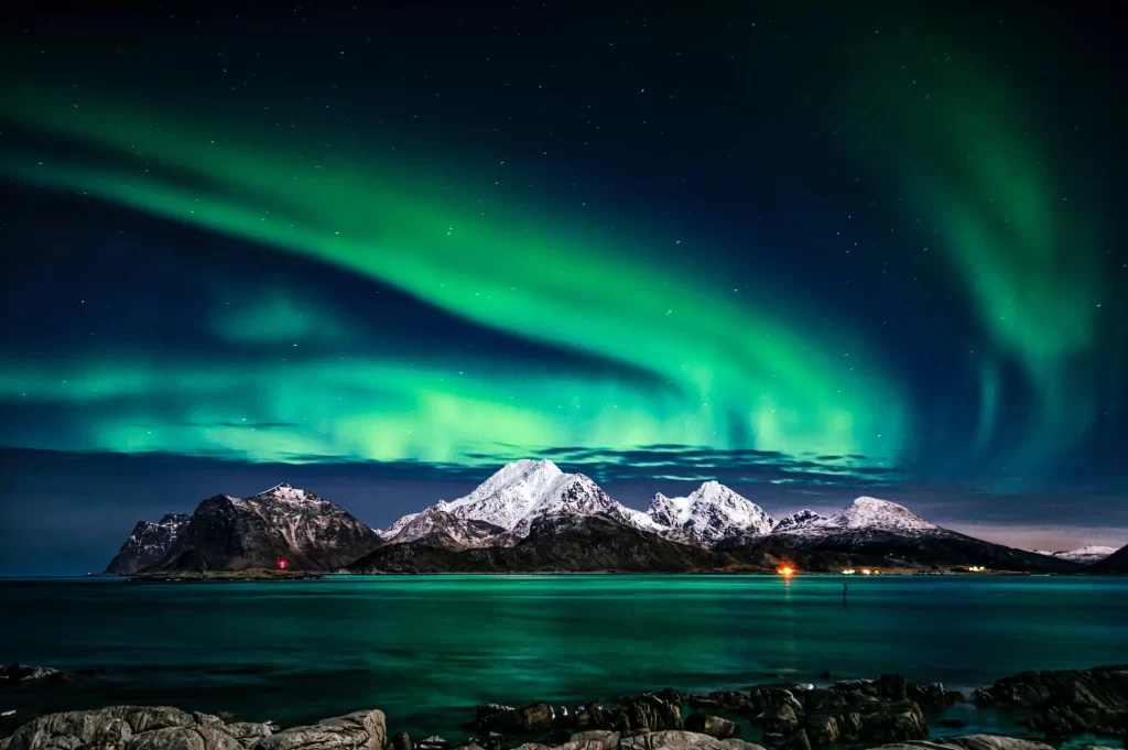 Northern lights visible over a landscape after a geomagnetic storm