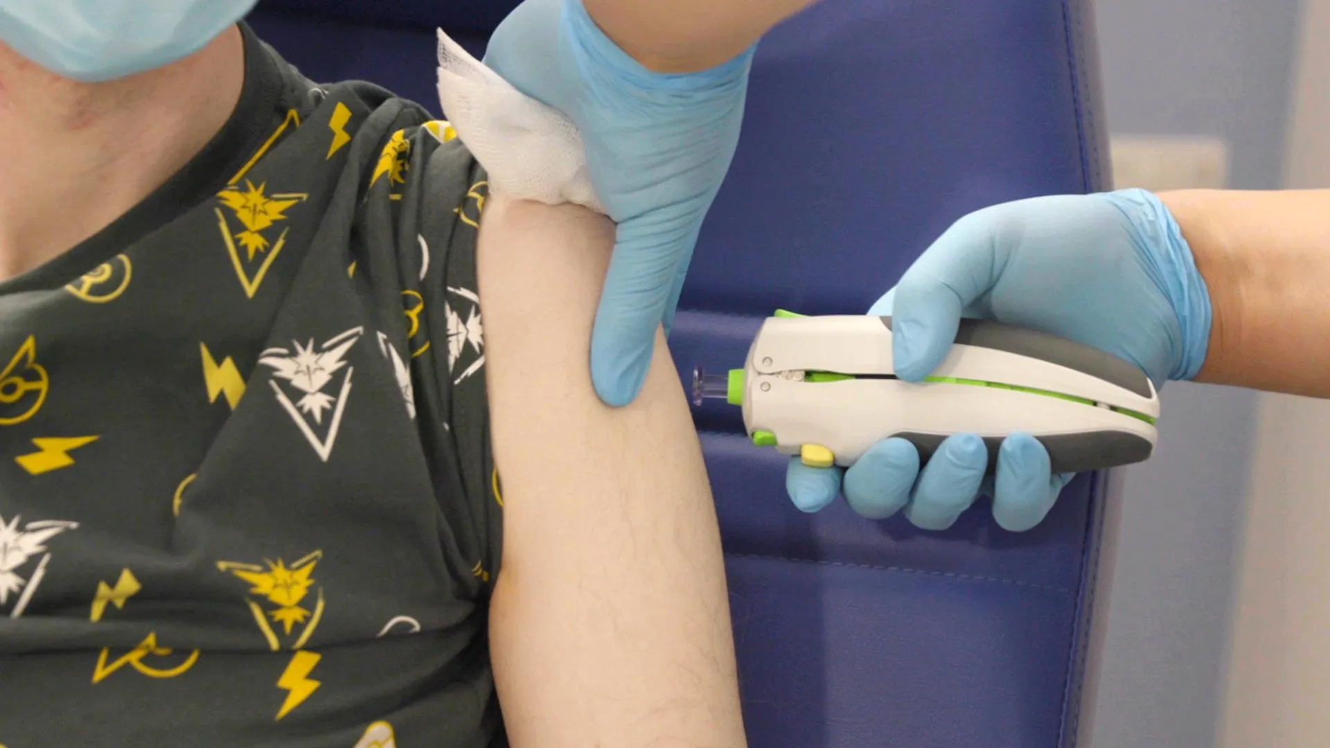 Clinical trial volunteer receiving a new universal vaccine injection