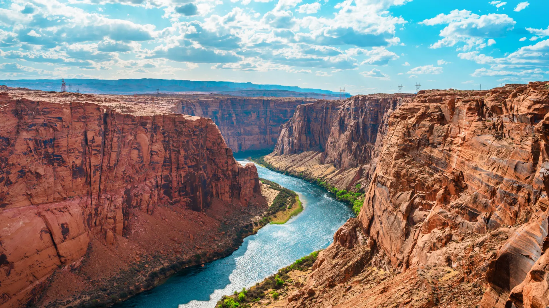 Aerial view of the Colorado River winding through red rock formations near Page, Arizona