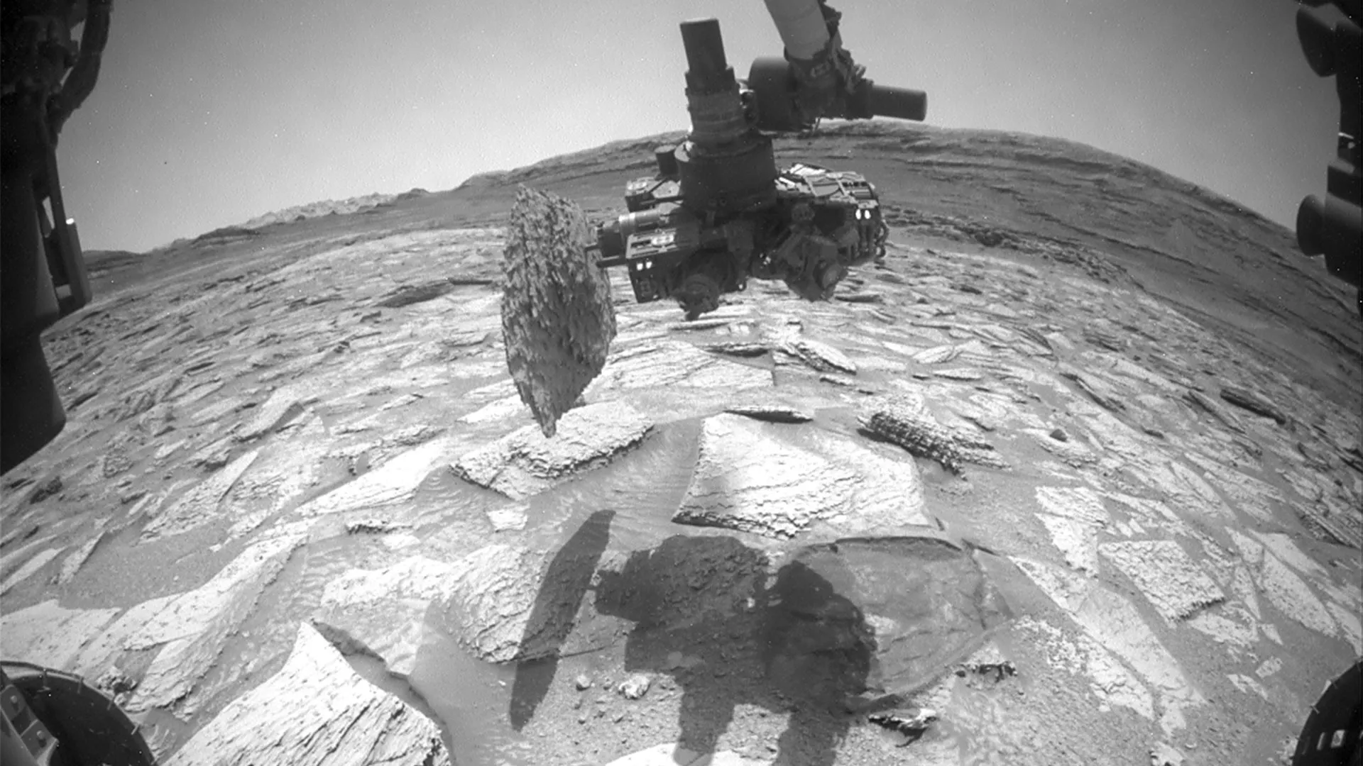 Curiosity rover's drill assembly stuck to the Atacama rock on Mars