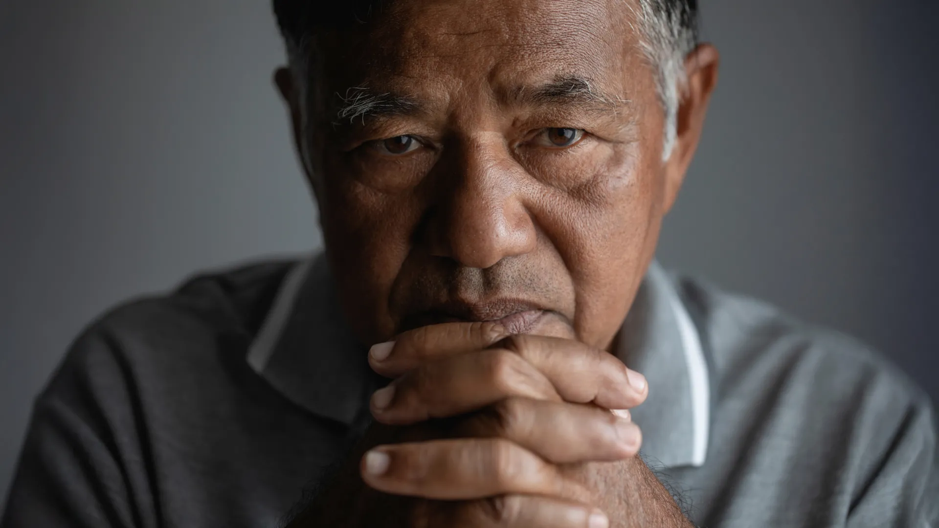 Close-up of stressed senior man, representing cognitive aging research