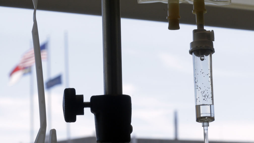 Infusion of a medication, illustrating the administration of Isembyld for SMA treatment