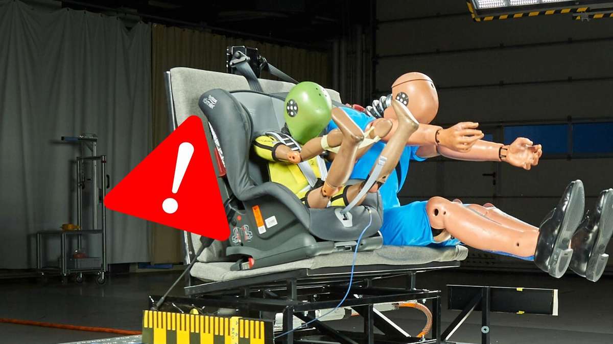 Crash test dummy in a child car seat during safety testing