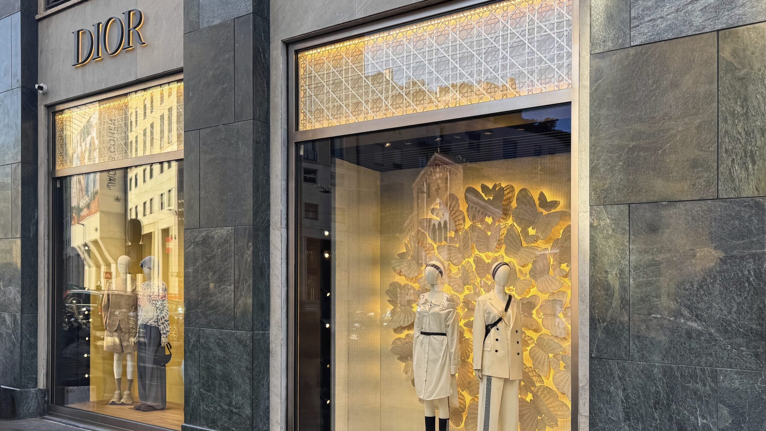 A model walks the Dior runway — luxury retailers face a structural reckoning after years of double-digit growth