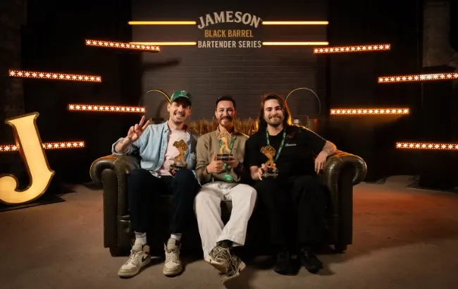 Three winners of the Jameson Black Barrel Bartender Series holding their awards