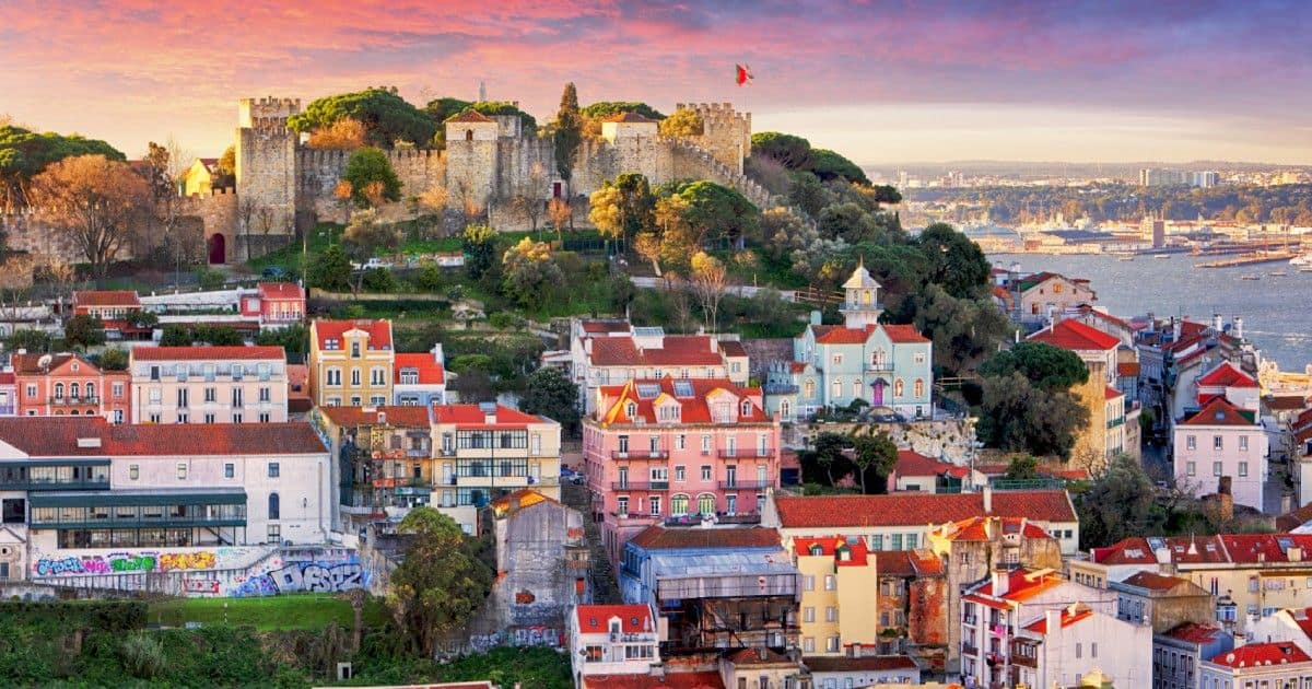Tourists and locals in Portugal highlighting the housing strain caused by digital nomad tourism