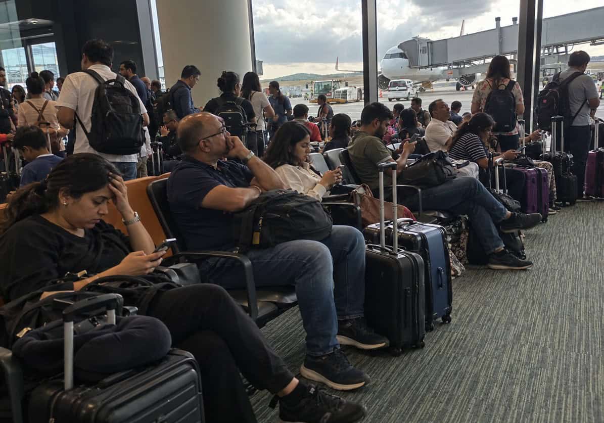 Passengers waiting at an airport terminal