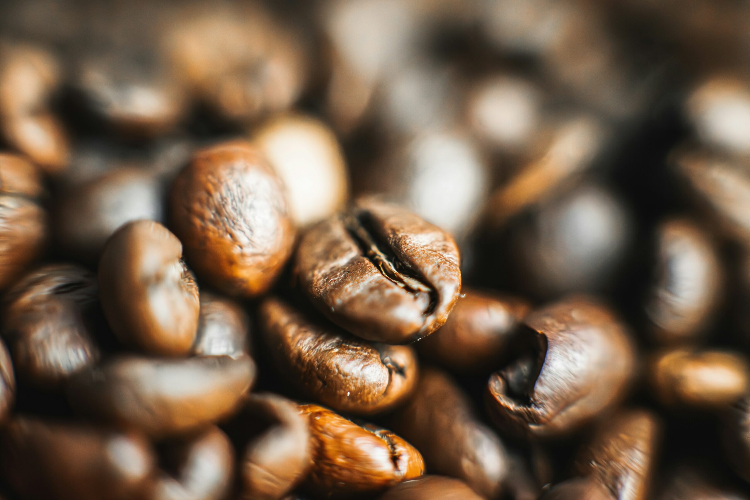 Brazilian coffee beans in a sack, illustrating Brazil's surging coffee exports